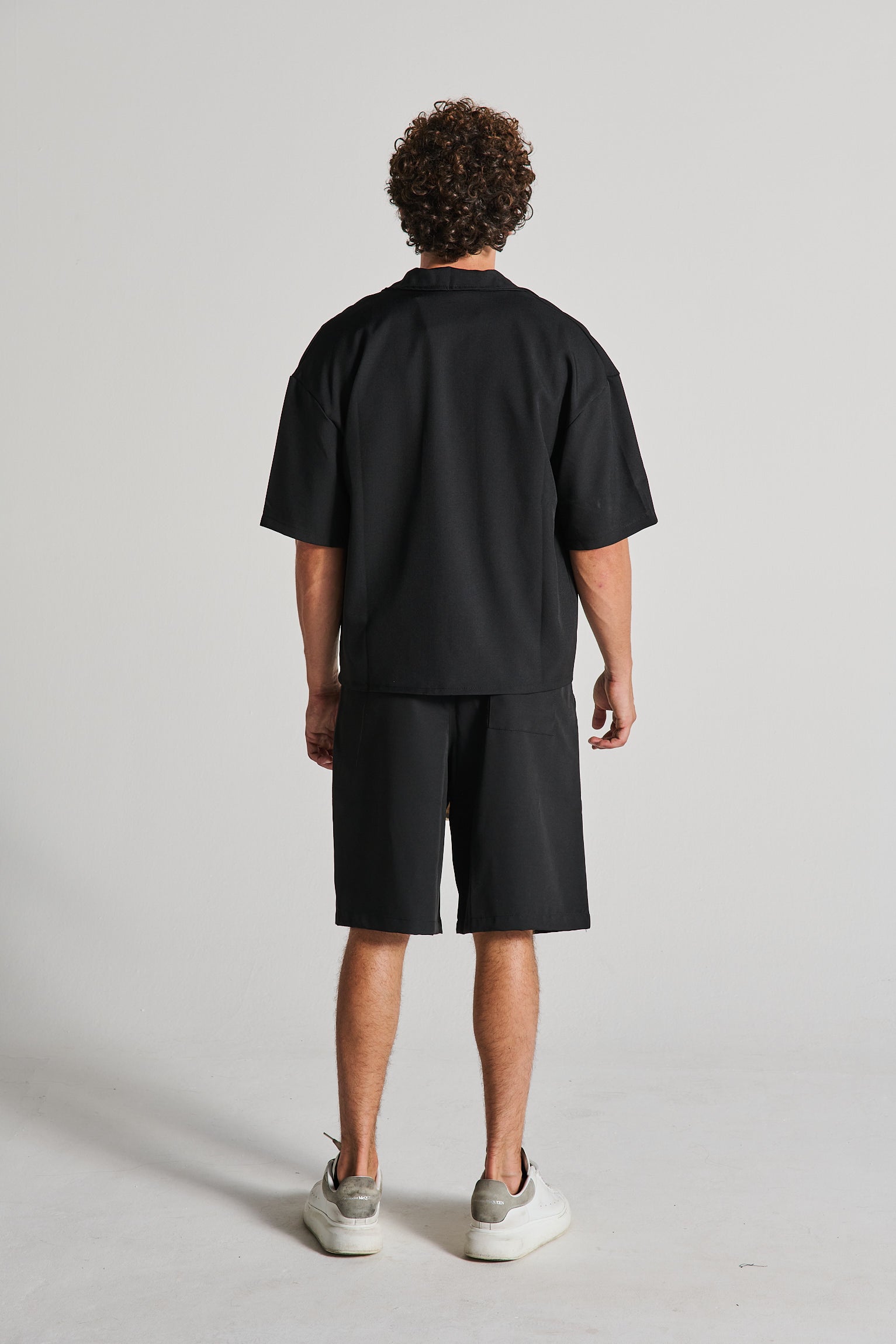 COMPLETO ZIP NERO BERMUDA