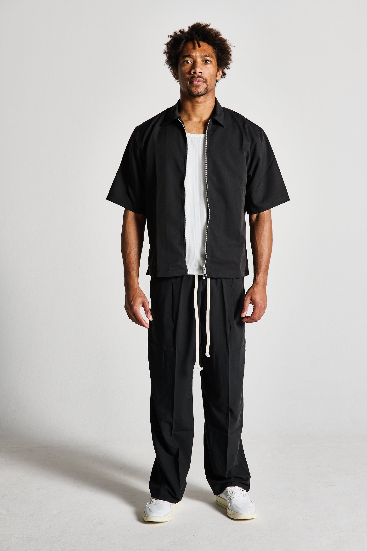 COMPLETO REBEL ZIP NERO