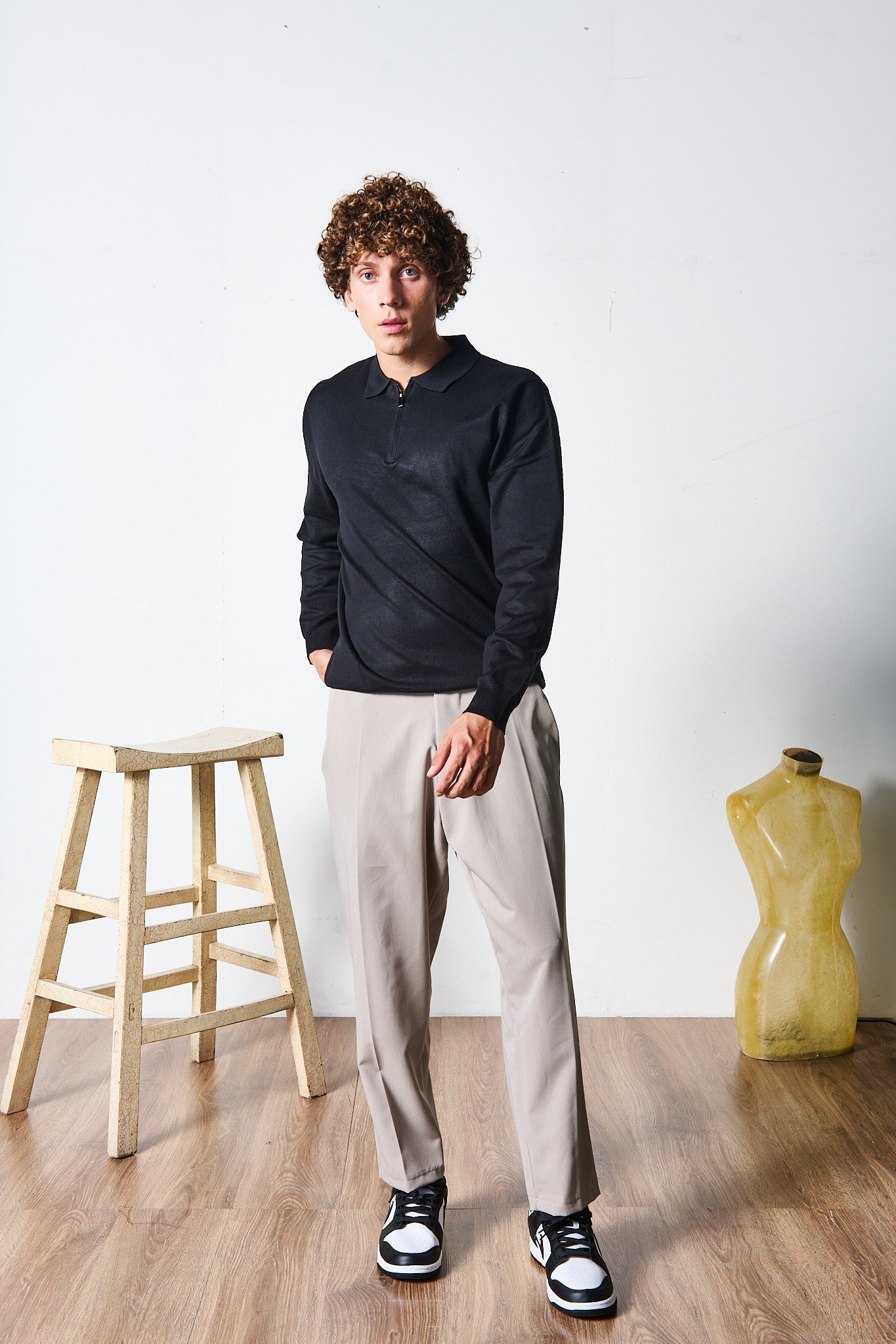 POLO ZIP NERA MANICA LUNGA