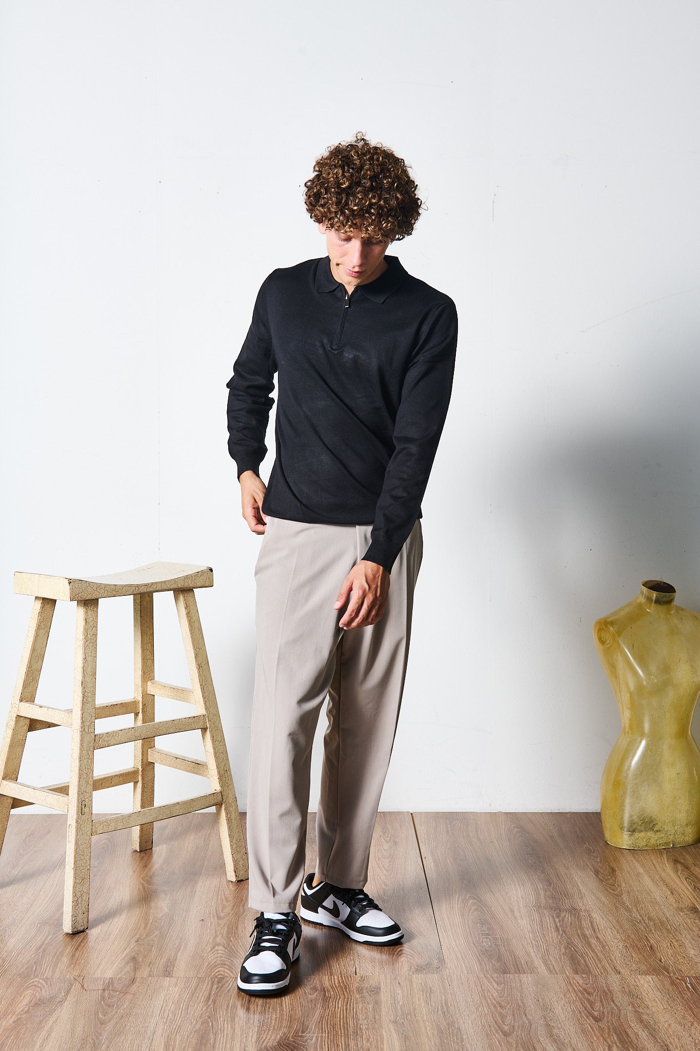 POLO ZIP NERA MANICA LUNGA