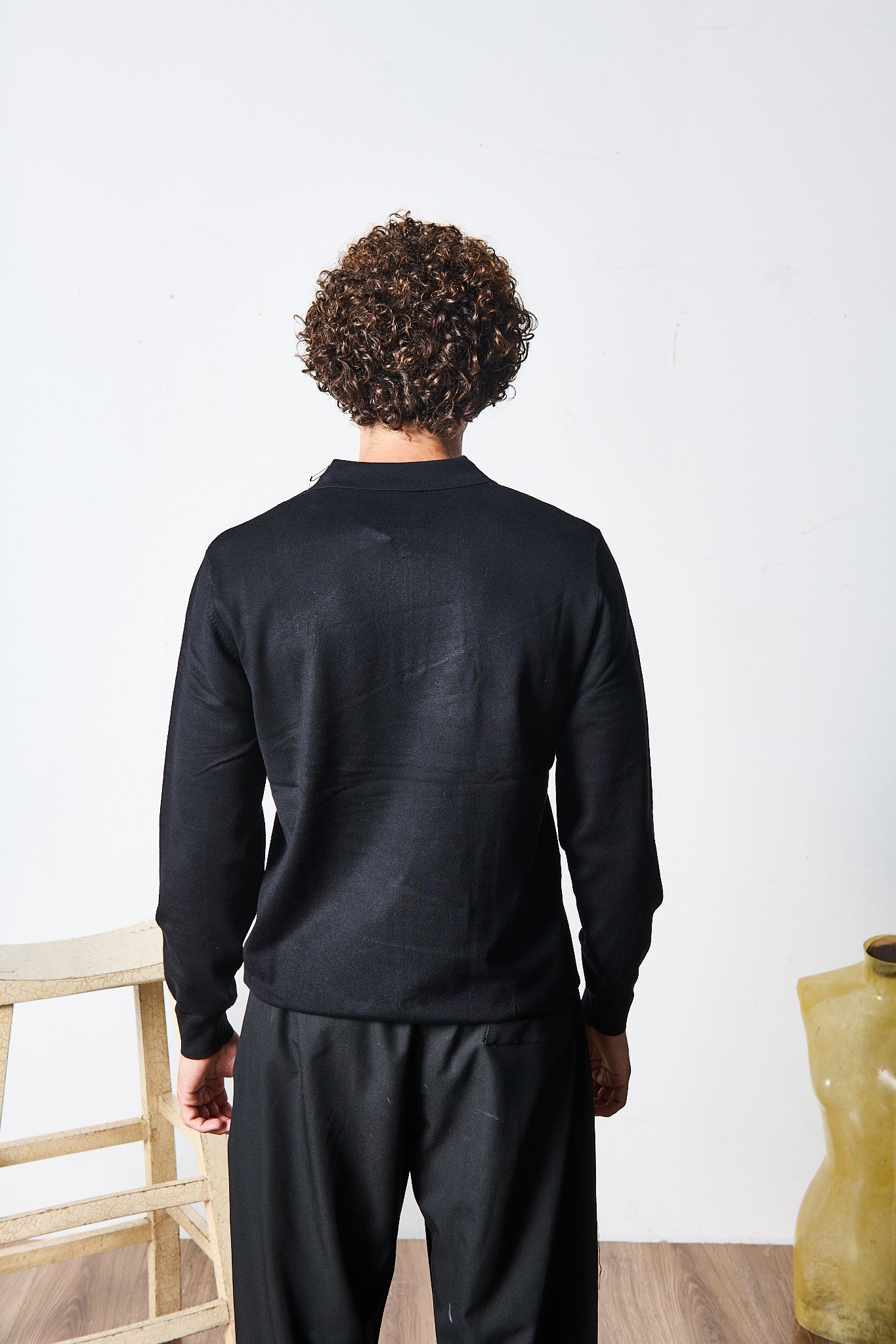 POLO ZIP NERA MANICA LUNGA